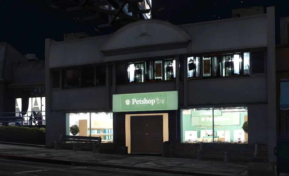 Our own Petshop MLO at night, with an illuminated sign and display windows